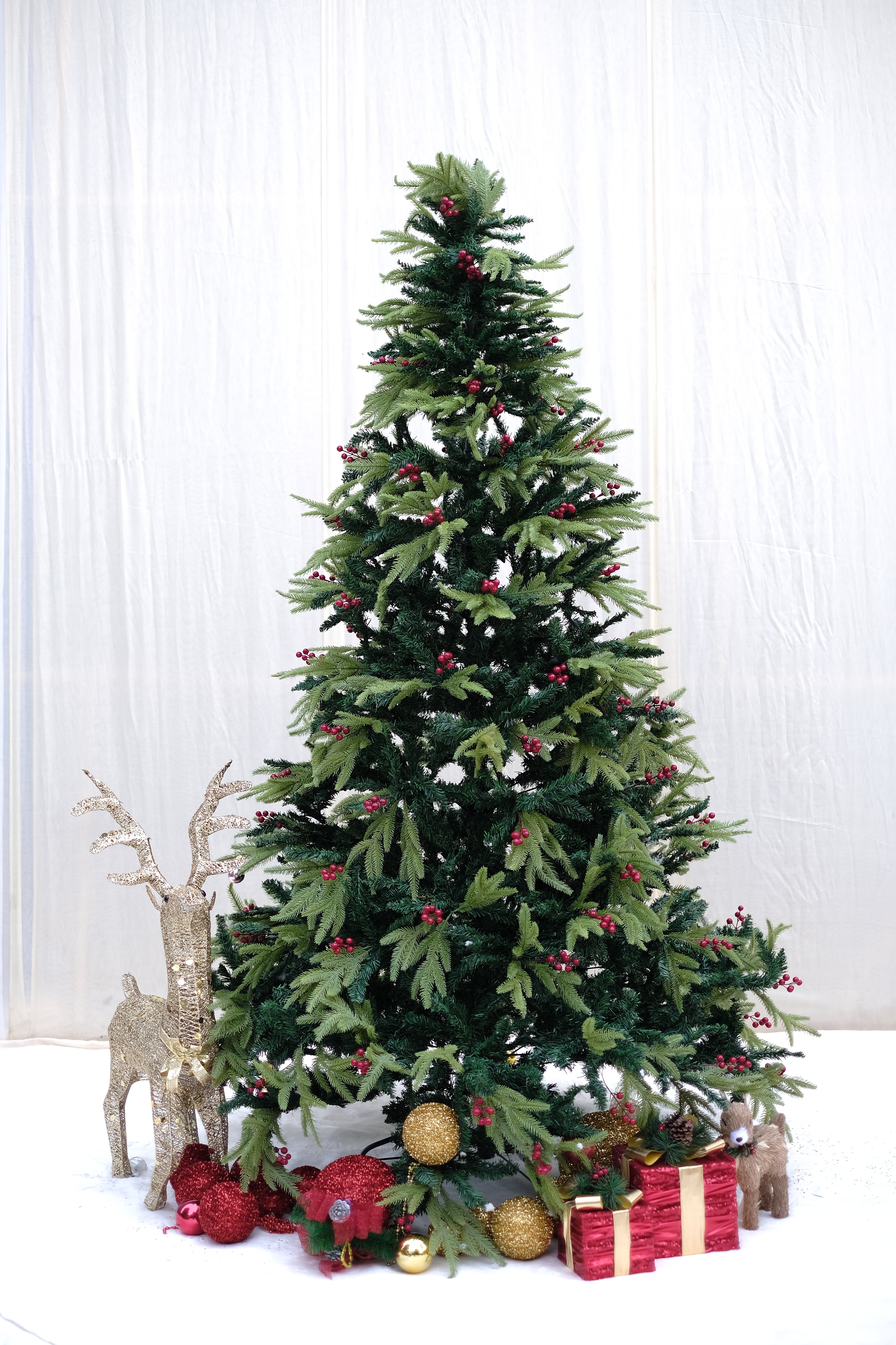 RAZ Christmas tree with cherries and dual color leaves – 8 feet