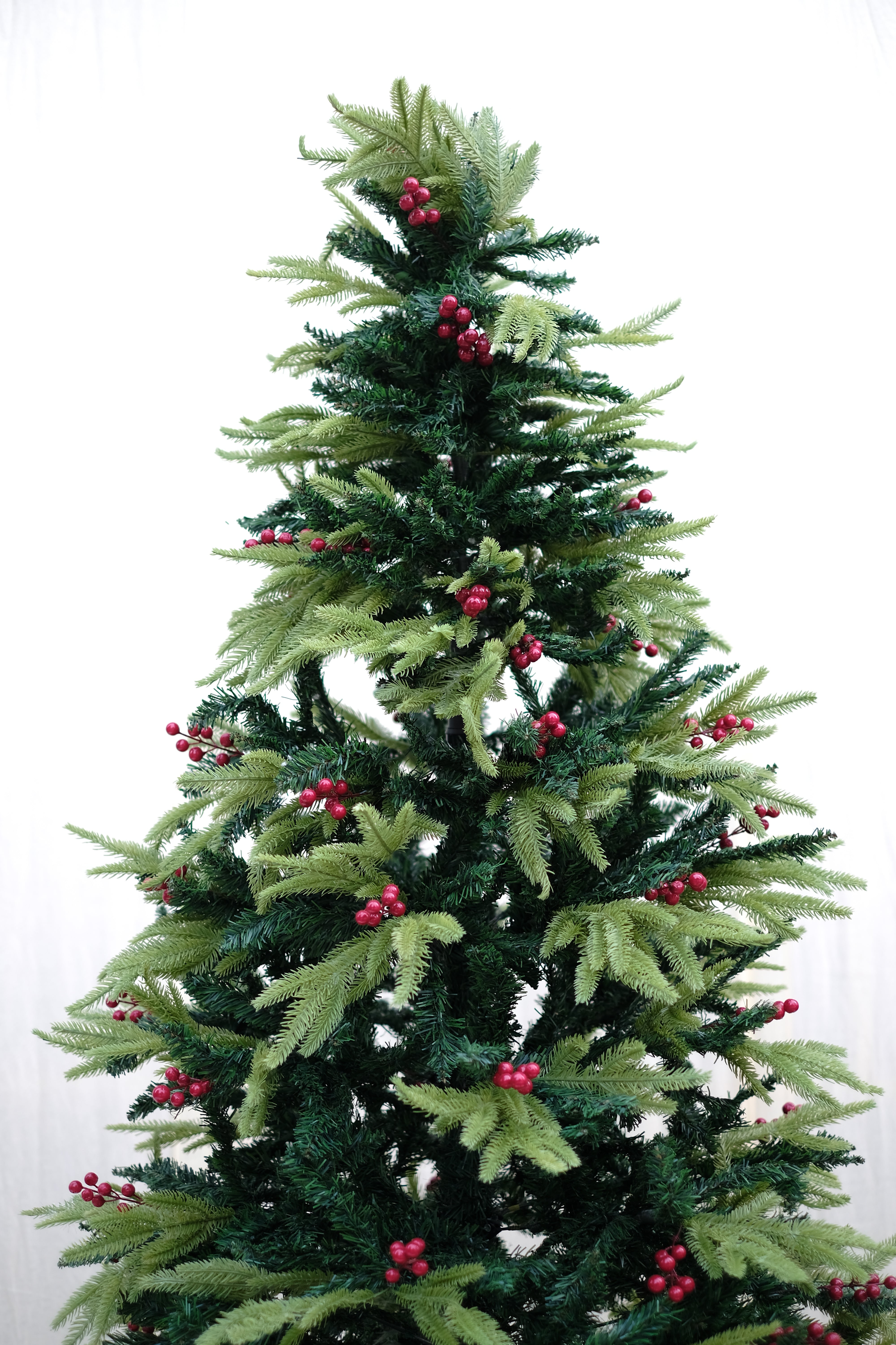 RAZ Christmas tree with cherries and dual color leaves – 8 feet