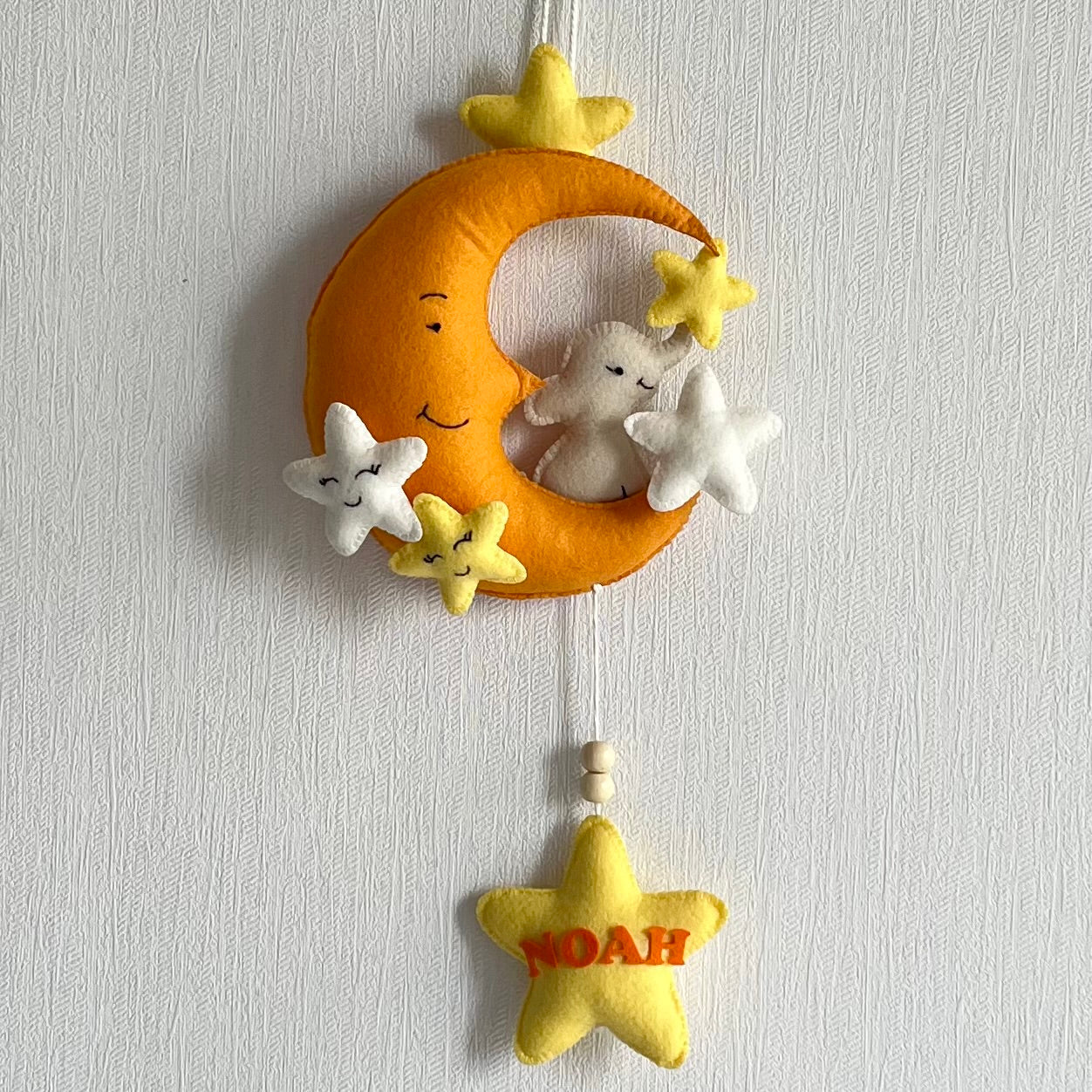 Baby Ellie on a Moon Name Hanging