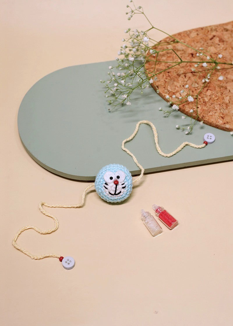 Doraemon handmade crochet rakhi by Haute By Hand – Raksha Bandhan gift India