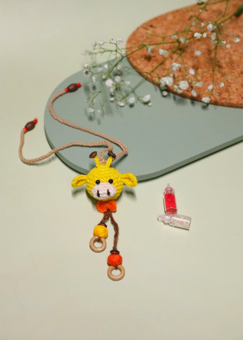 Giggling Giraffe handmade crochet rakhi by Haute By Hand – Raksha Bandhan gift India