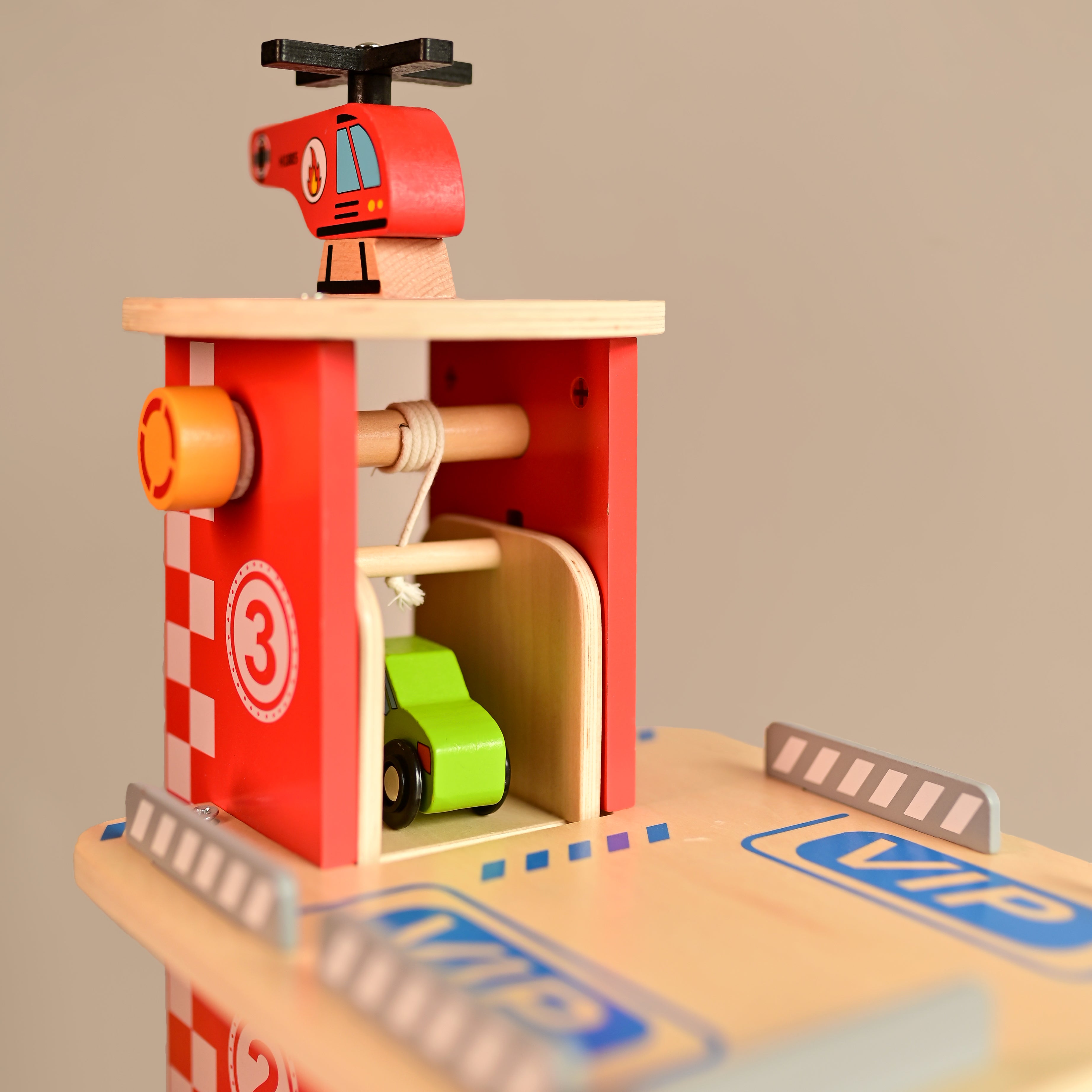 Drive in-Multilevel Activity Center with Helicopter Pad, Moving Elevator & Rapid Descent Ramps Pretend Play Toy Develops Motor Skills & Creativity – Age 3+ years