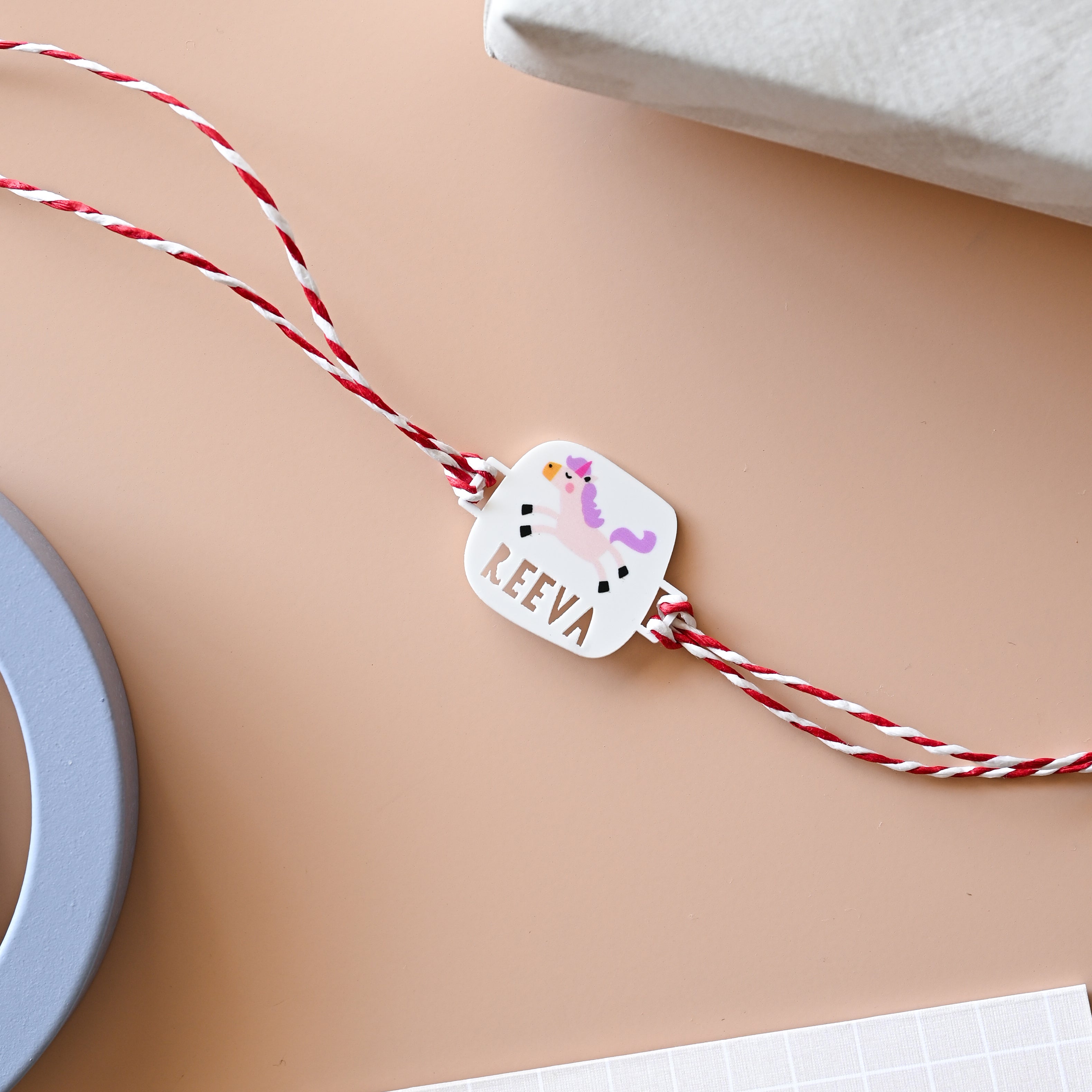 Personalised printed unicorn rakhi on a gift card – Totdot
