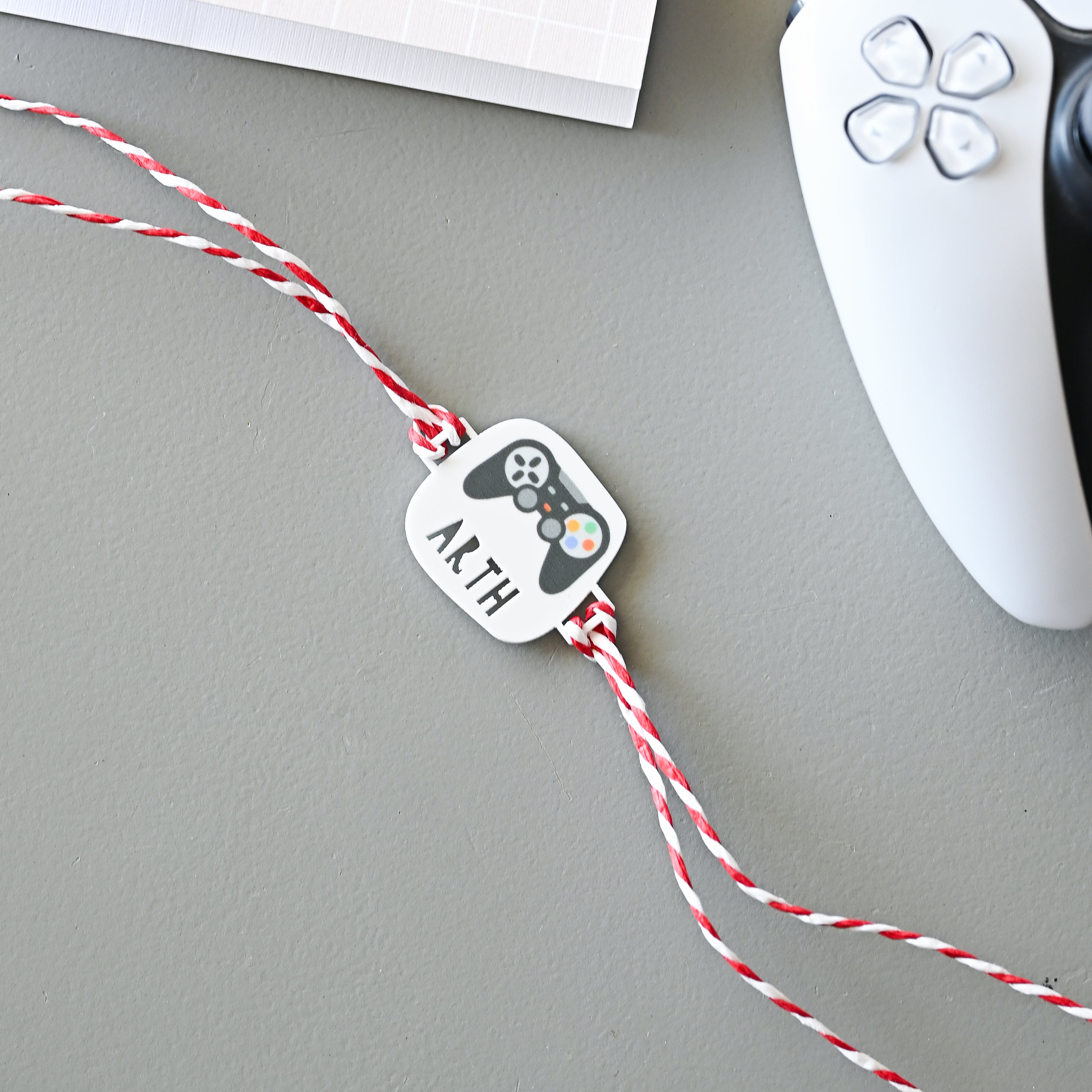 Personalised printed video game rakhi on a gift card – Totdot
