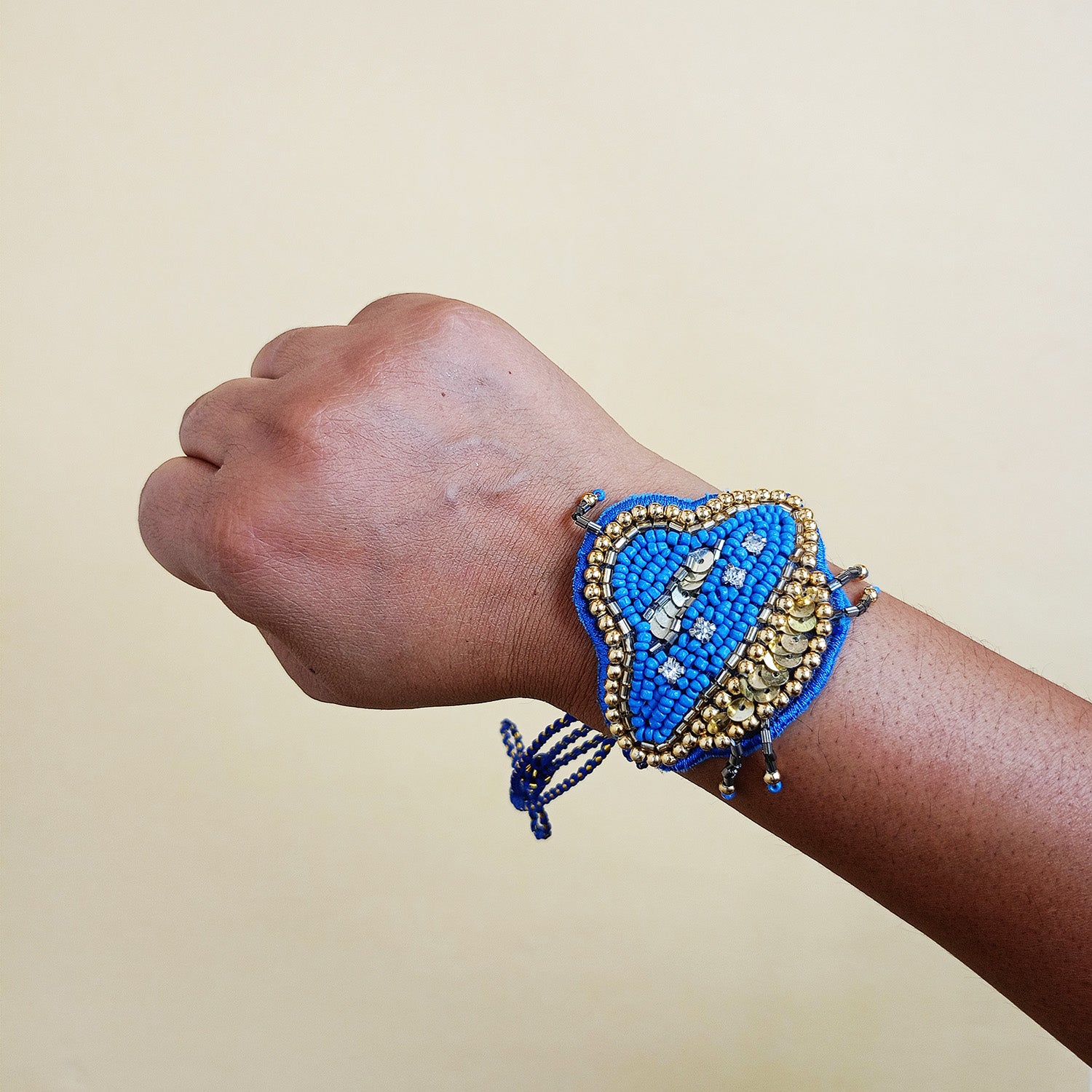 Spaceship Beaded Rakhi - converts to a Brooch