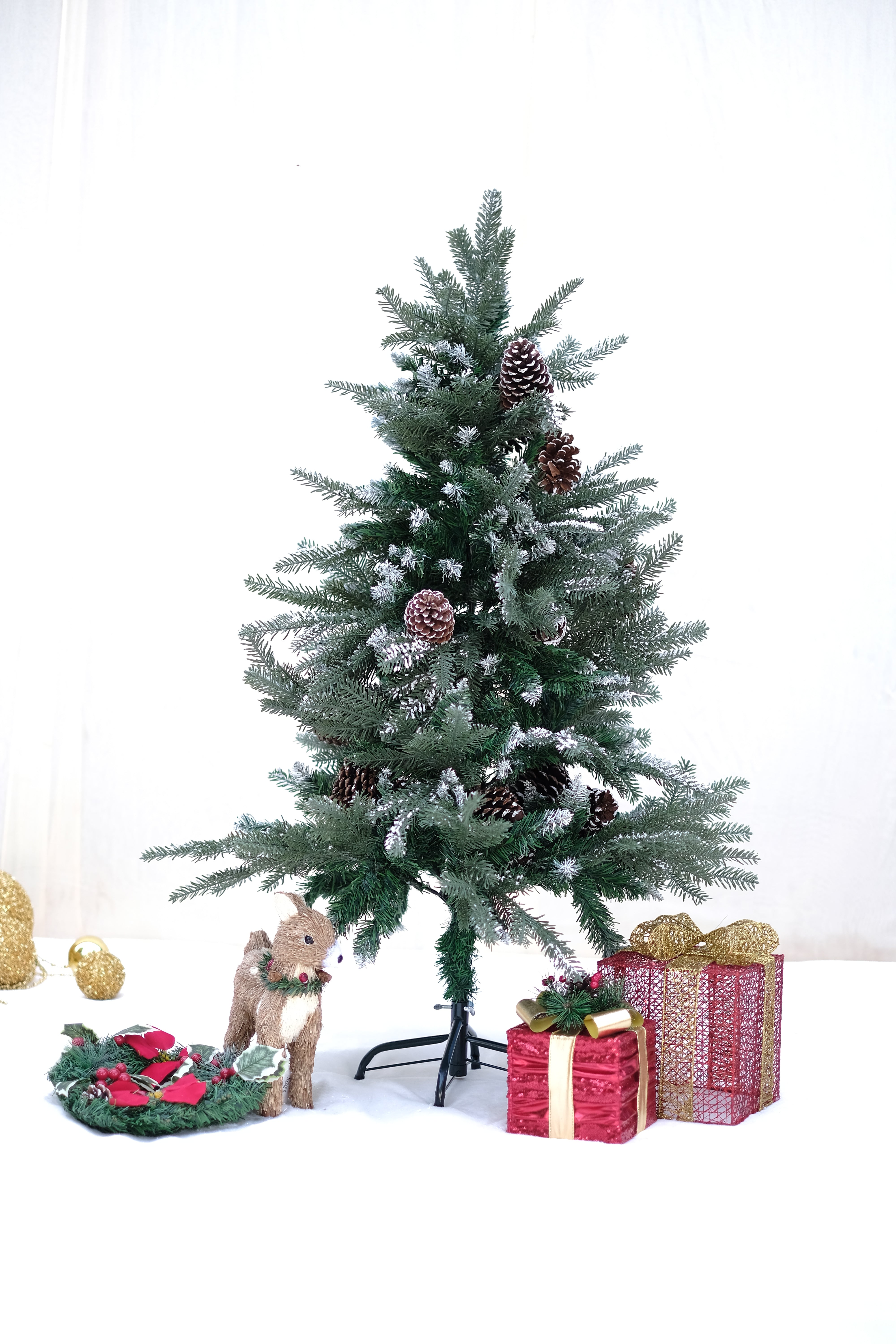 BALSAM Christmas tree with light frosting and large pine cones – 4 feet