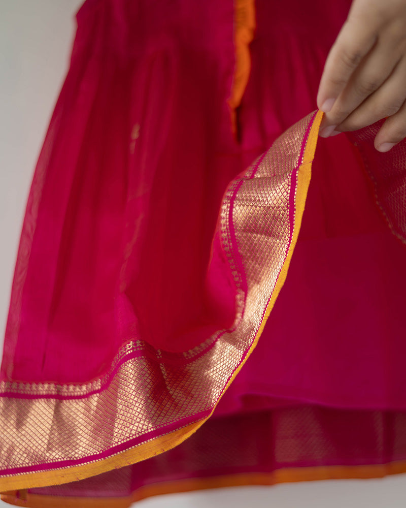 Kamal pink pintuck baby girl dress in handwoven cotton silk