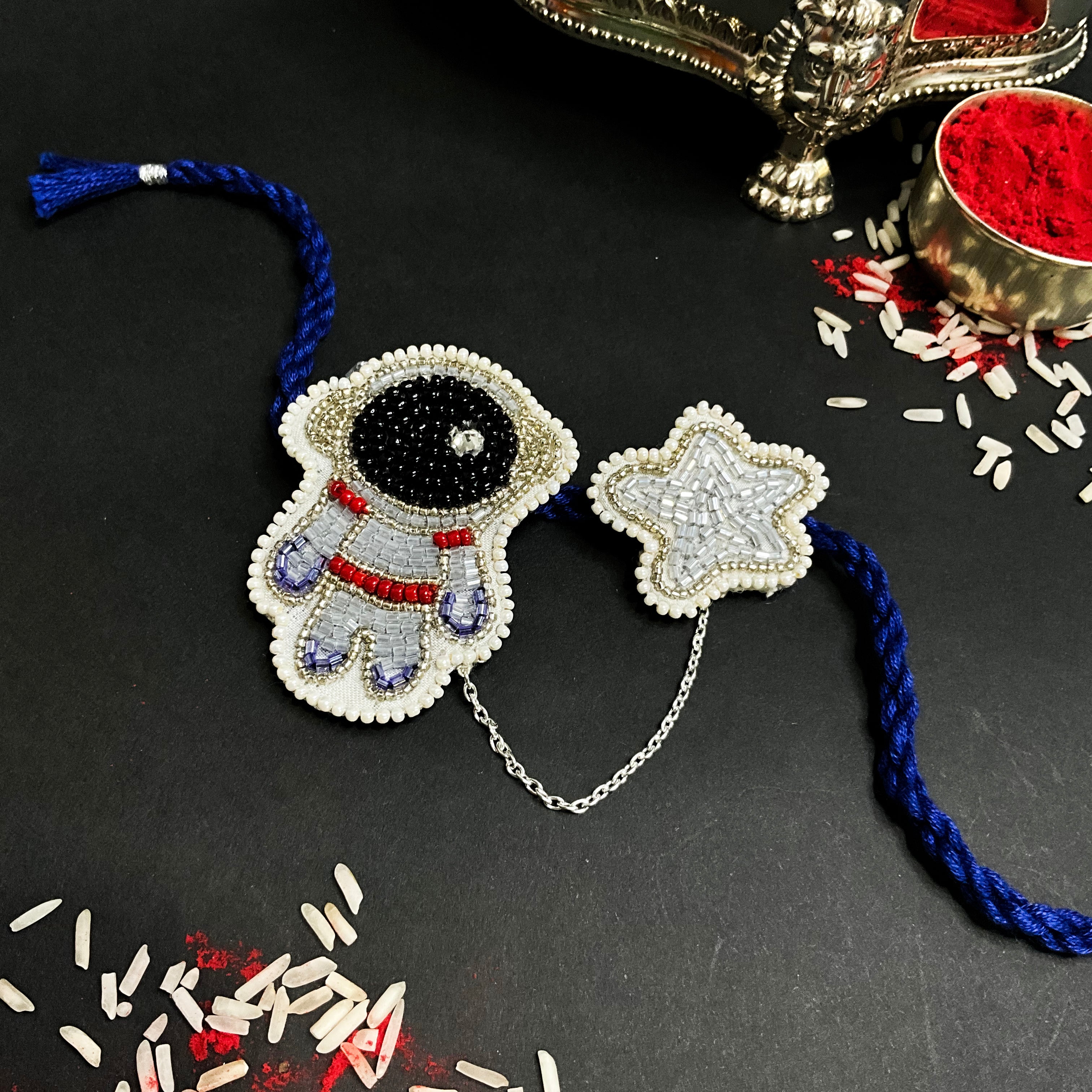 Astro-Tie Of Togetherness - Astronaut Rakhi + Brooch