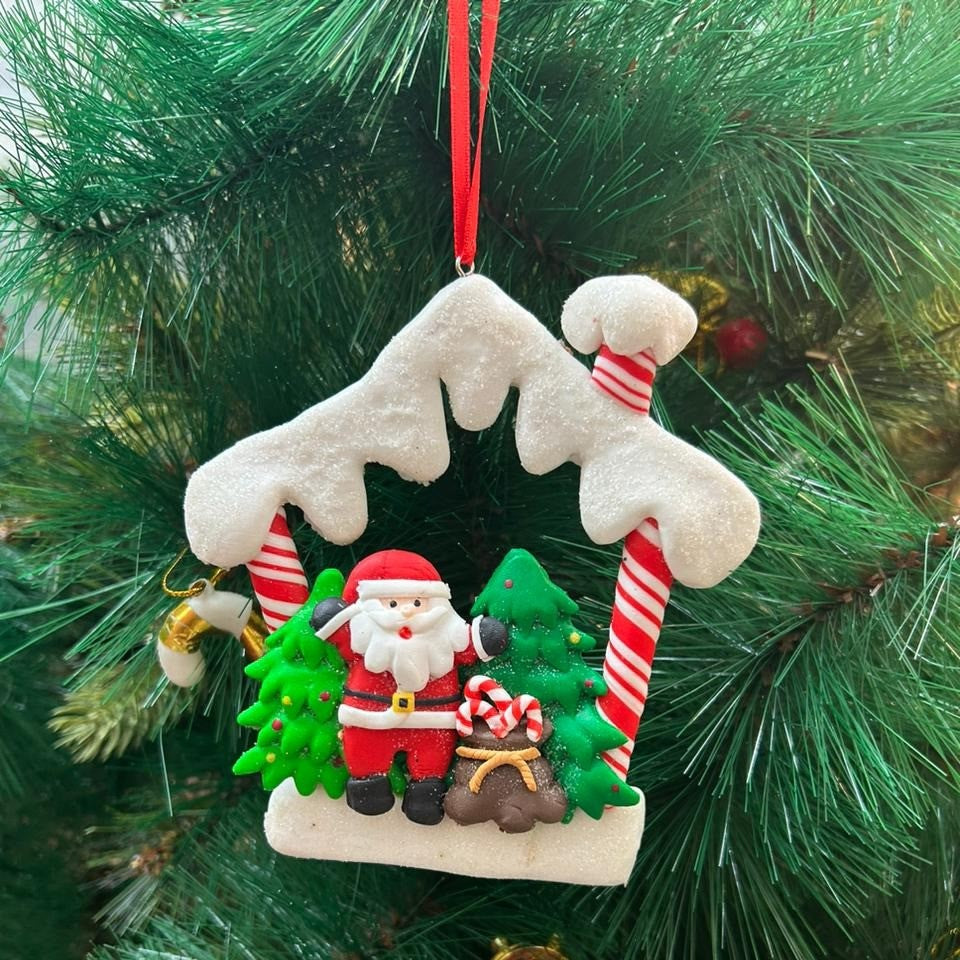 Santa in a hut Ornament