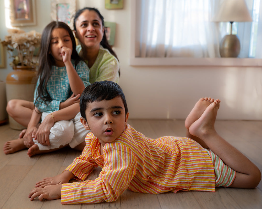 Sleepover Party’ unisex cotton set with peach yellow striped kurta and peach green striped shorts