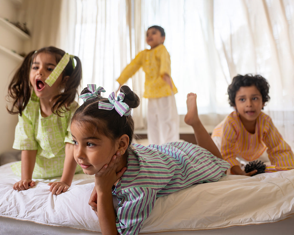 Sleepover Party’ unisex cotton set with lime green moon chase kurta and purple green striped shorts