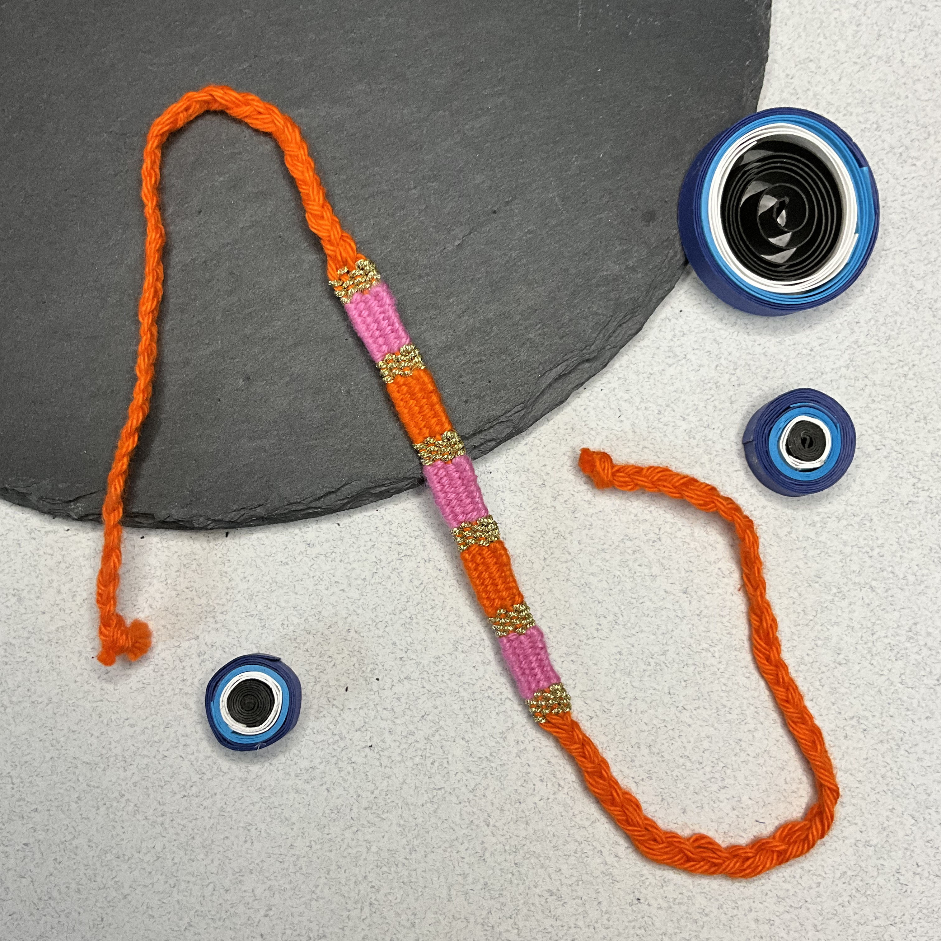Orange Ethnic Weaved Threads Rakhi