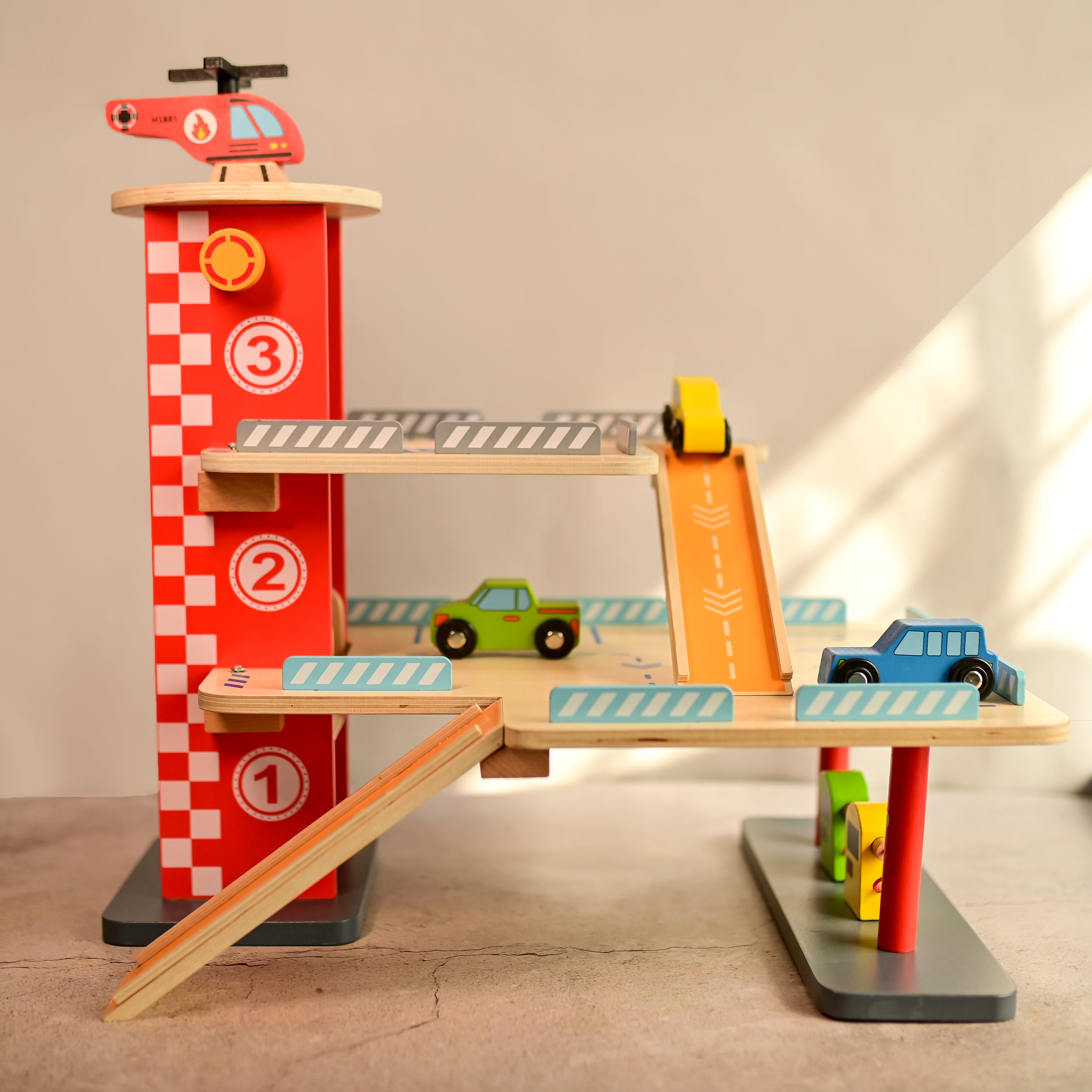 Drive in-Multilevel Activity Center with Helicopter Pad, Moving Elevator & Rapid Descent Ramps Pretend Play Toy Develops Motor Skills & Creativity – Age 3+ years