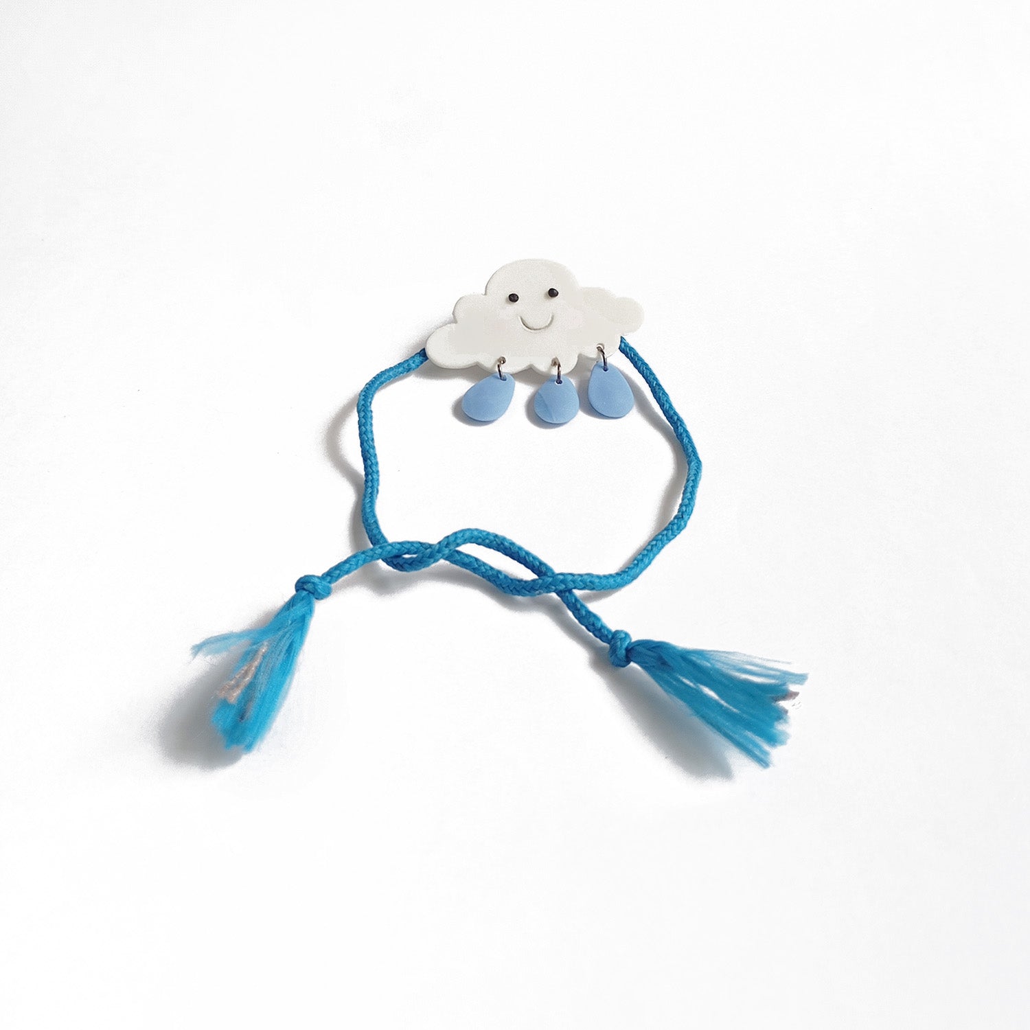 Cloud & Rain Rakhi - Converts To Brooch