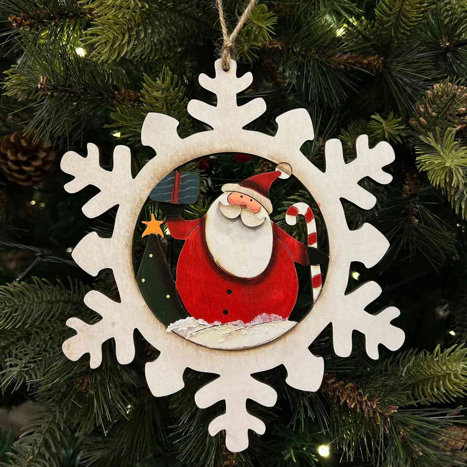 Happy Santa in a Snowflake Ornament