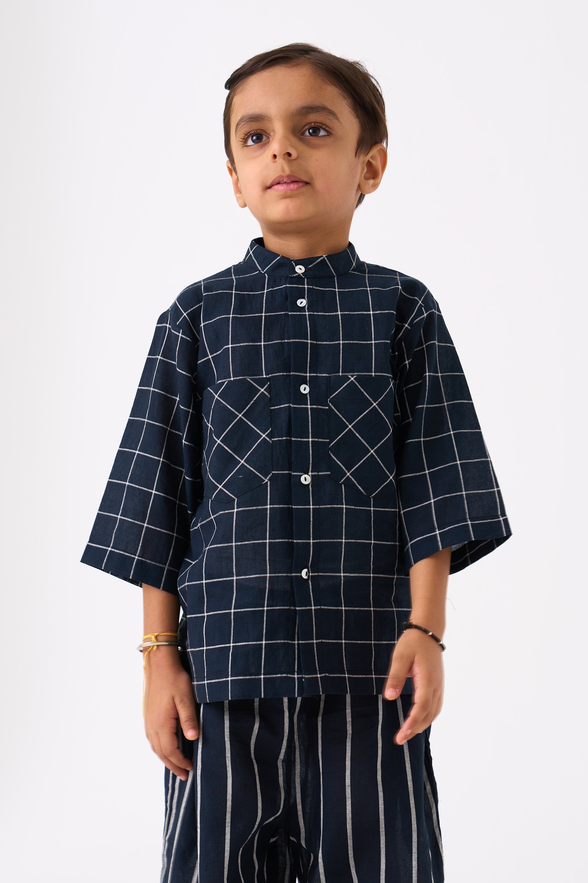 DIAGONAL CHECK POCKET SHIRT