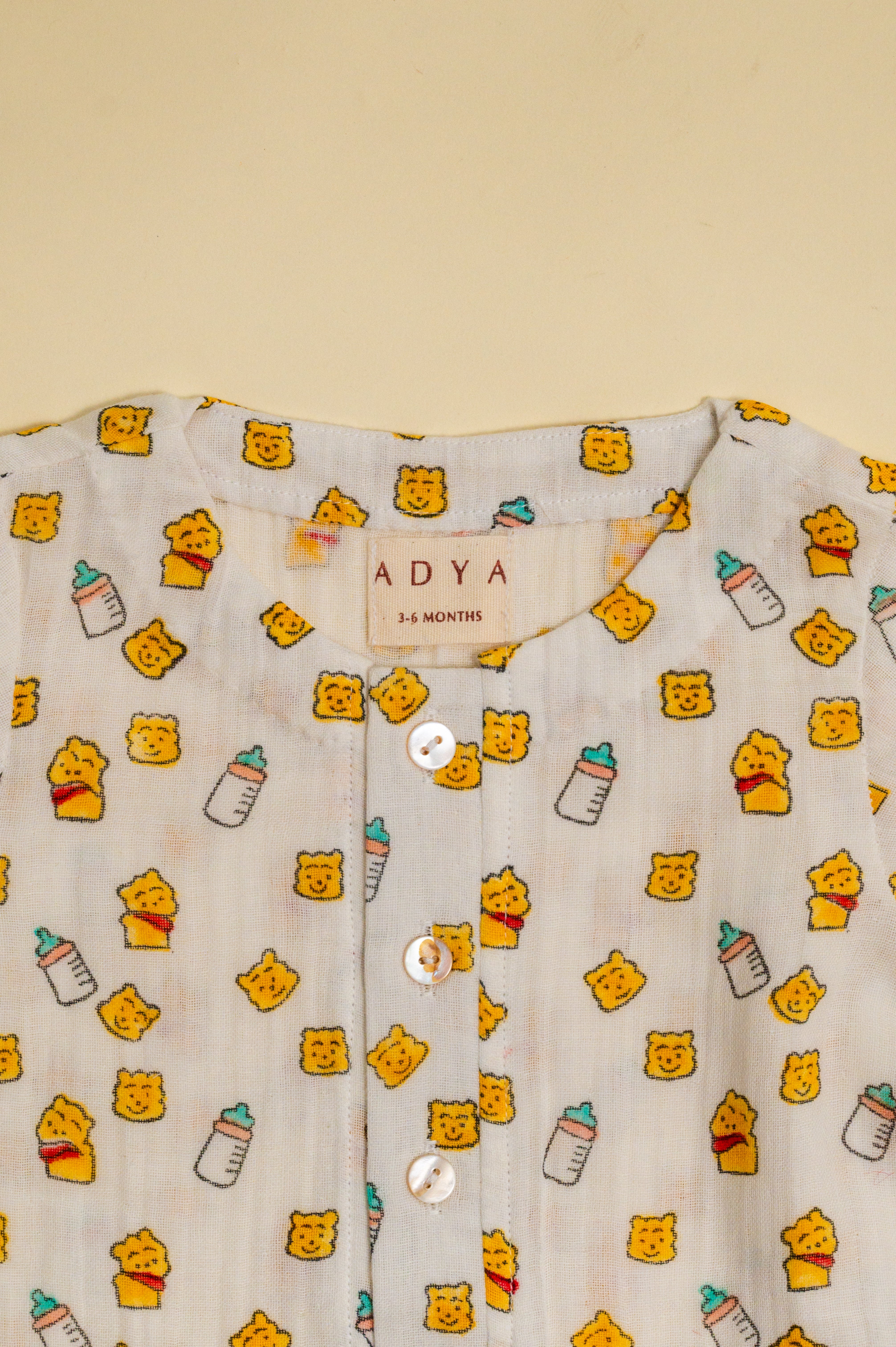 Yellow Pooh Infant Romper