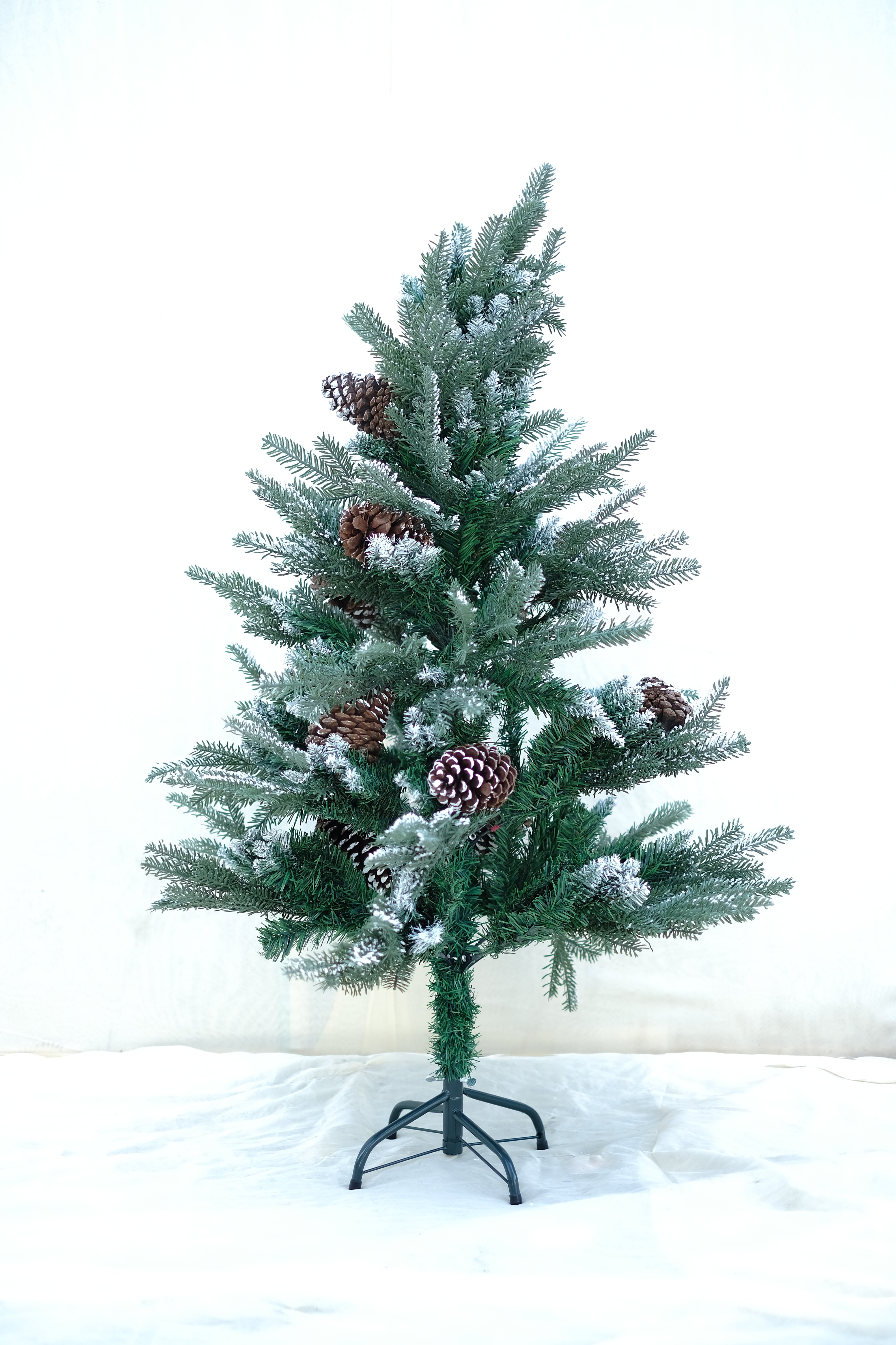 BALSAM Christmas tree with light frosting and large pine cones – 4 feet